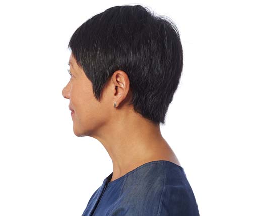 A woman wearing RIC hearing aids
