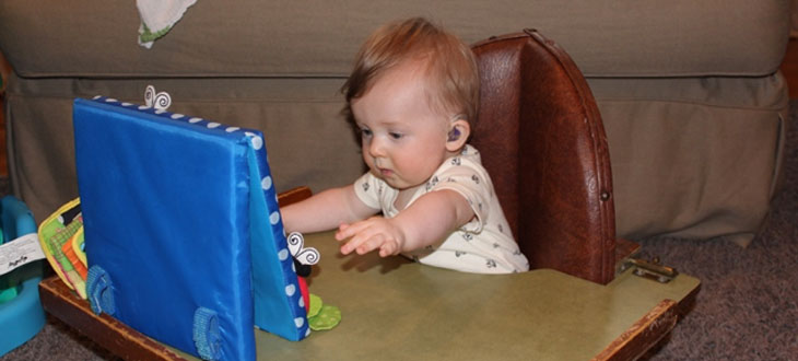 Frankie as a baby with his hearing aids.