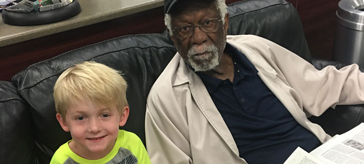 Frankie sits with Bill Russell at Starkey Hearing Technologies.