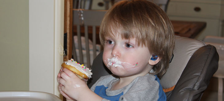 Frankie celebrates his birthday with new hearing aids.