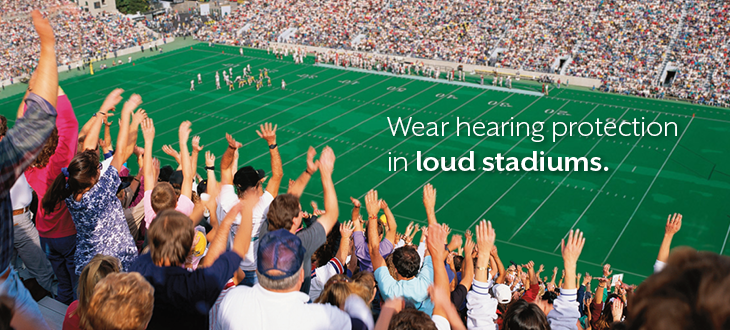 Wear hearing protection like ear plugs at football games.