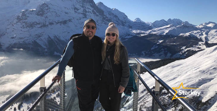 image of Morgan and her dad, Paul, overlooking a mountain on vacation.